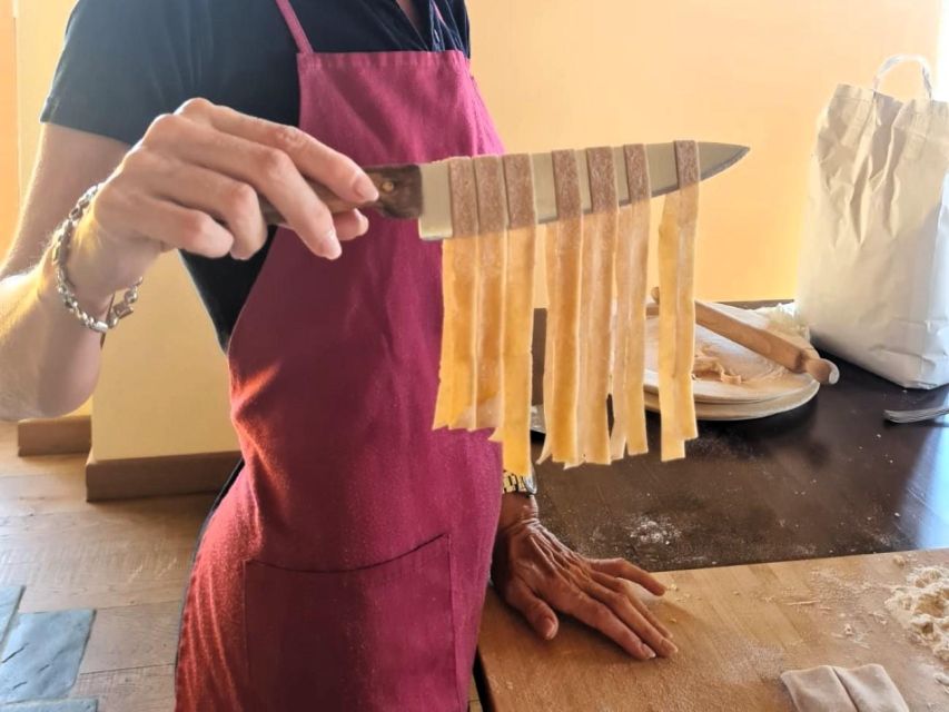 Arezzo: pasta e tiramisù cooking class organic Tuscan farm - Sitting down to the meal you made