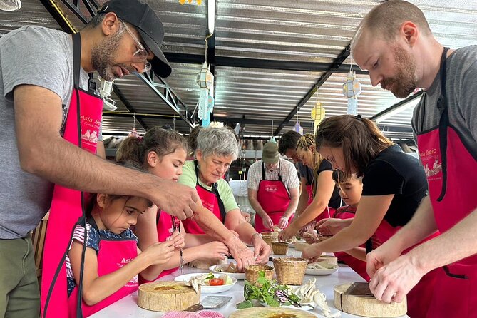 Authentic Thai Cooking Class and Farm Visit in Chiang Mai - Choosing six dishes from a very Thai menu