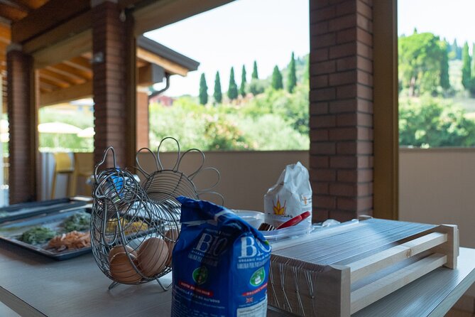 Bardolino: Garda Lake Pasta Cooking Class at the Agritourism - Shaping ravioli with a professional chef