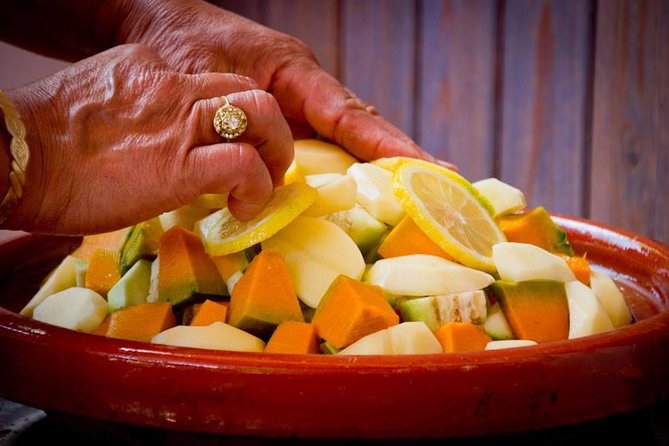 Berber Cooking Class at a Farm in the Countryside & shopping at a rural Souk. - Steaming couscous in a traditional clay pot