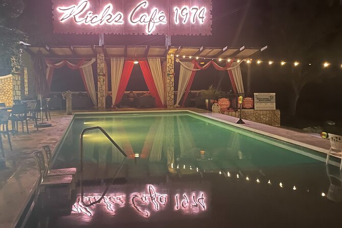 Blue Hole Mineral Swim, Negril Ricks Cafe, & Herb Farm Combo Tour - The lighthouse, flowers, and native birds