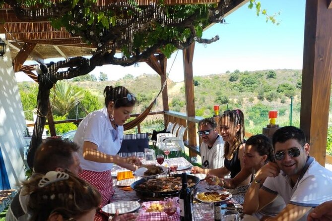 Chefcooking Paella from our Andalusian Grandmother at a Family Farm - Sangria, local produce, and the farm story