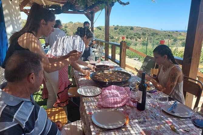 Chefcooking Paella from our Andalusian Grandmother at a Family Farm - The starter table: mussels, ham, cheese, and bread