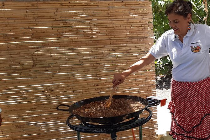 Chefcooking Paella from our Andalusian Grandmother at a Family Farm - What the hosts add to the experience