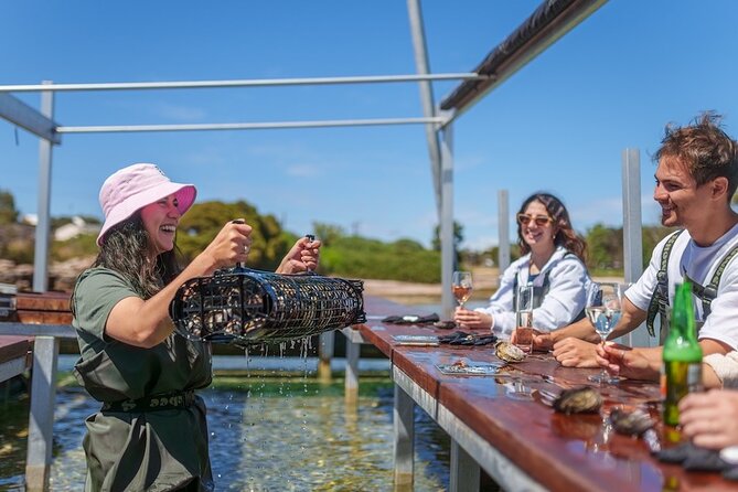 Coffin Bay Oyster Farm Wading Tour & Tasting Experience - Learning how oysters grow from spat to market