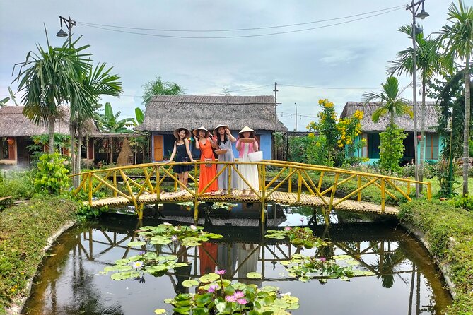 Cooking Class Hoi An - Organic Garden - Farming Tour-Handicrafts - Walking the organic garden before cooking