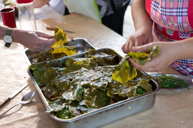 Cretan Cooking Class at a Farm with Hotel Pickup and Drop-Off - The shared Cretan dinner and homemade wine