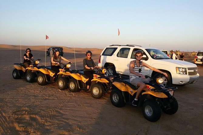 Dubai Desert Morning Tour in 4WD Vehicle: Camel Ride, Quad Bike Tour, Sandboarding, and Camel Farm - The camel ride is traditional, but very short