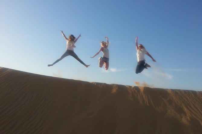 Dubai Desert Morning Tour in 4WD Vehicle: Camel Ride, Quad Bike Tour, Sandboarding, and Camel Farm - Guides and group size can shape the morning