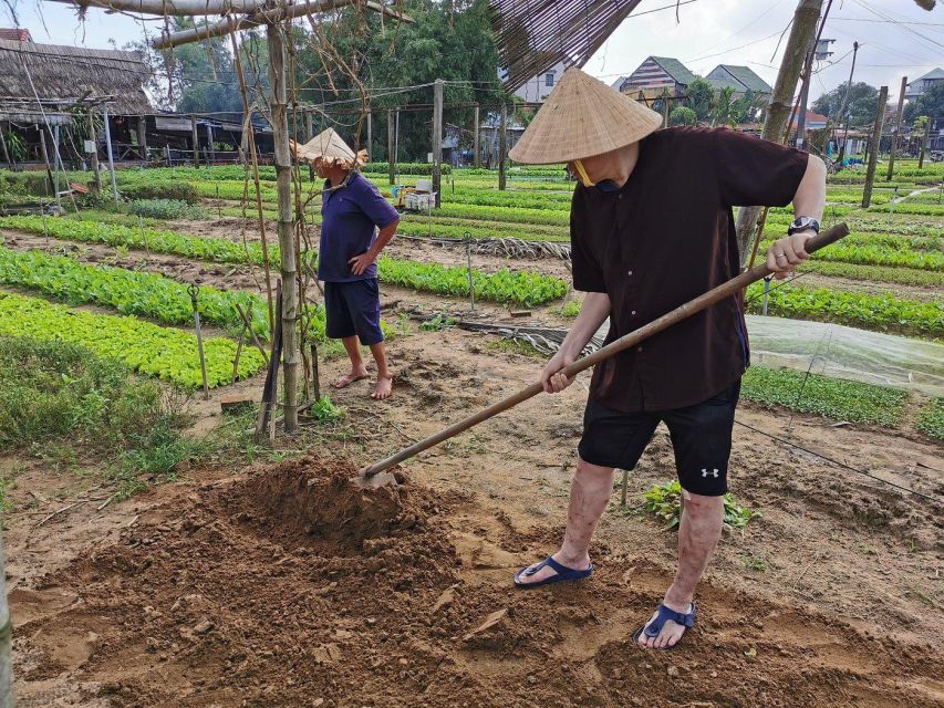 Farming with Farmers at ancient vegetable Village "Tra Que" - Rowing a basket boat among coconut palms