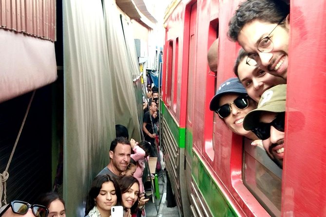 Floating & Railway Market and Coconut Farm Tour [Optional Luxury] - Mae Klong Railway Market: the train takes the aisle