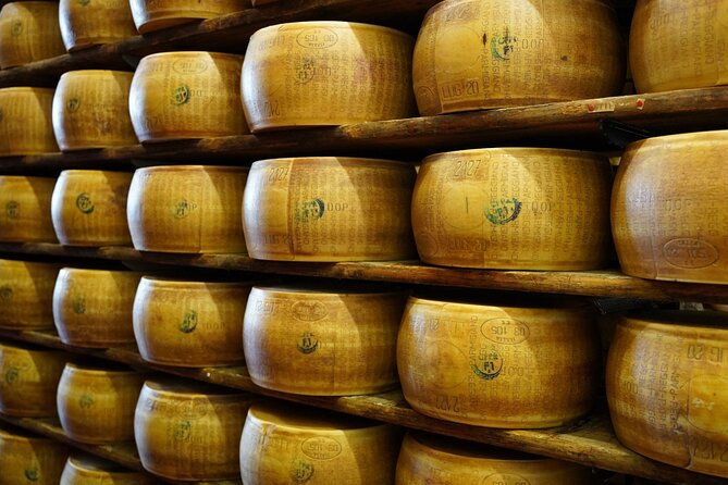 From Parma: Parmigiano Reggiano Farm Tour & Tasting with Transfer - Hammer tests, fire branding, and the final approval