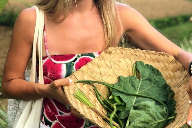 From Ubud: Authentic Bali Farm Cooking School & Organic Farm - Picking vegetables on an 8,000-square-meter organic farm