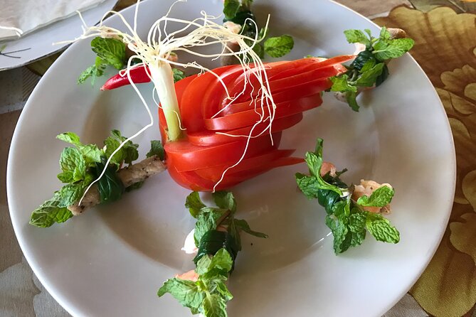 Gardening at Tra Que Vegetable Village and cooking class - Learning to make tam huu and banh xeo