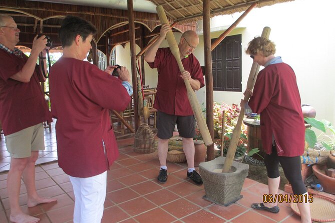 Hoi An Home Hosted Meal in Rice Farmer Home - Preparing a rice pancake from fresh flour