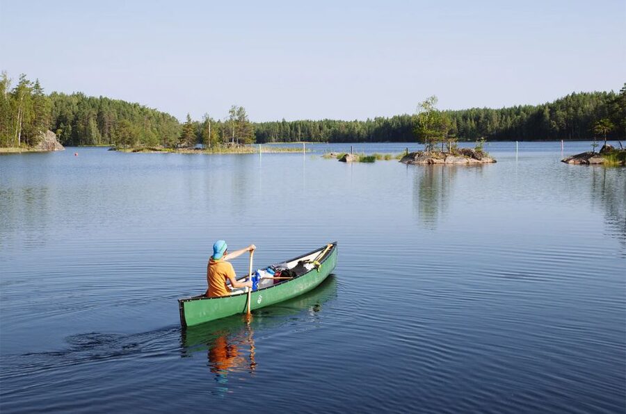 Lapland: Canoeing Trip with Reindeer and Husky Farm Tour - Meeting the huskies and checking the weather