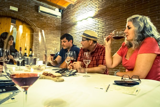 Montserrat & Winery Visit Tour with Traditional Farmhouse Lunch - Four wines and a family cellar