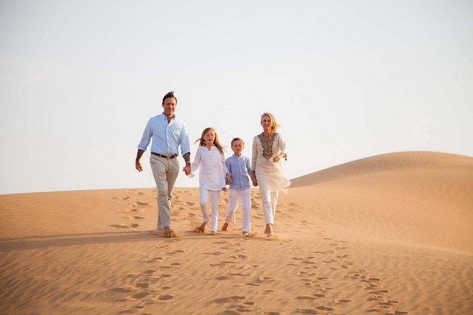 Morning Desert Safari From Abu Dhabi -Camel Ride,Sand Boarding,Camel Farm Visit - Sunrise over Abu Dhabi’s golden dunes