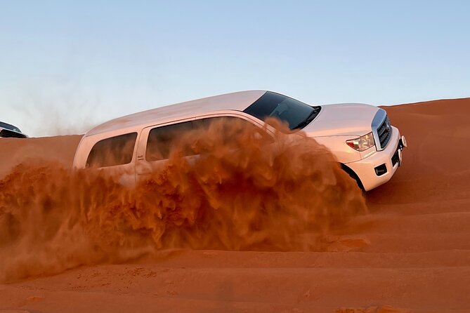 "Morning Desert Safari with Camel Farm visits & Arabic Treats" - Dune bashing across the red sands