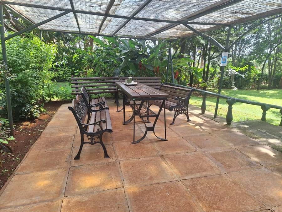 Nairobi: Tea Farm Day Trip with Lunch at kiambethu - Ending with tea, gardens, and a bonfire