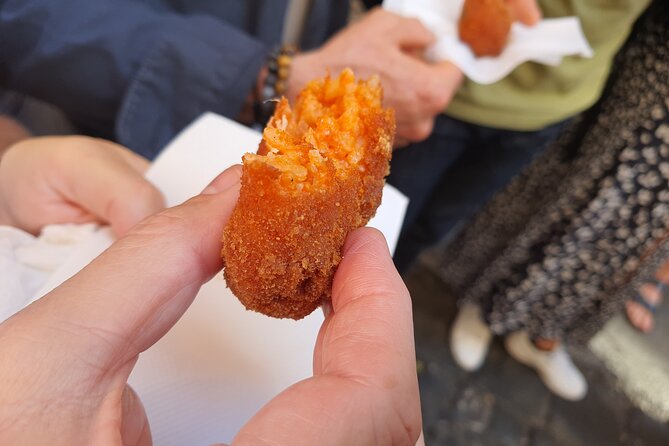 Rome City Center Largest Farmers Market and Street Food Tour - Prati brings a polished Roman setting