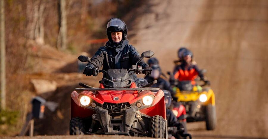 Rovaniemi: Quad Bike Safari, Reindeer & Husky Farm Visit - Meeting reindeer at a working farm