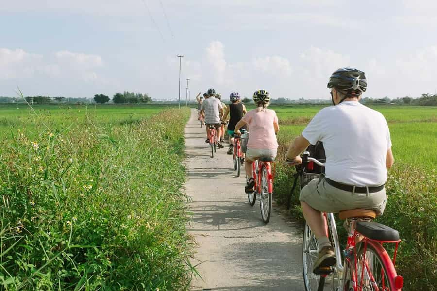 Rural Cycle, Market Tour, Basket Boat & Organic Farm Cooking - Guides make the four hours work