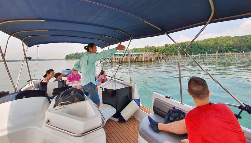 Singapore: Guided Boat Tour and Kelong Fish Farm Visit - Sembawang Beach and the first stories of Singapore