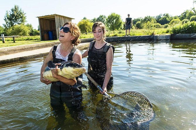 Sturgeon Fish-Farm Visit and Caviar Master Class Tasting in Neuvic - Walking through the sturgeon farm