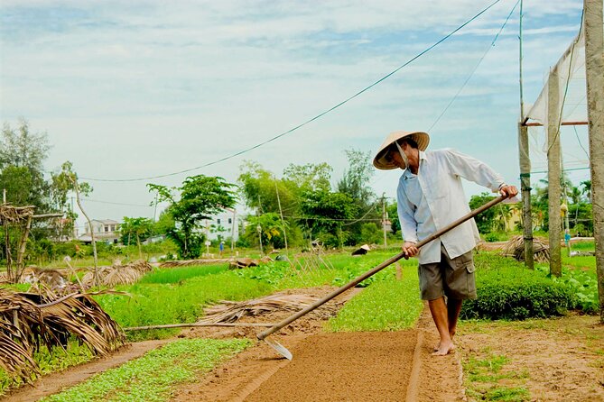 Tra Que Village Cycling And Farming - Making rice paper with local guidance