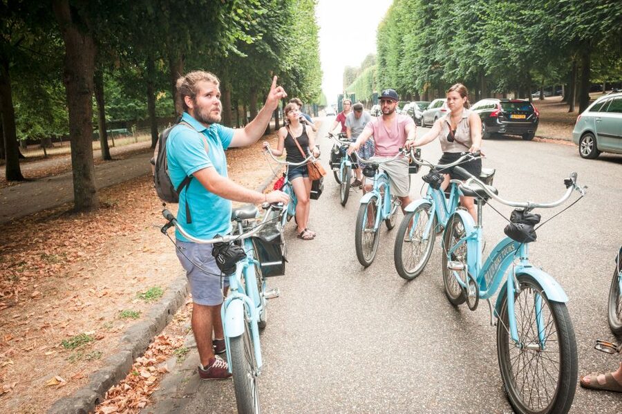 Versailles Bike Tour with Palace & Queen Farm Entrance - Riding through the royal grounds