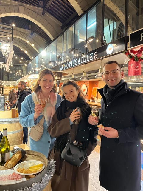 Versailles: Local & small-group Farmers' Market Food Tour - Choosing charcuterie and watching the cheese platter take shape