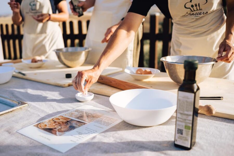 Volterra: Fresh Pasta Cooking Class at a Tuscan Farmhouse - Wine, conversation, and the family-table mood