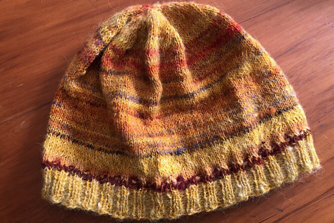 Wool Sheep Farm Experience with Handmade Wool Hat in New Zealand - Angie’s personal style of guiding